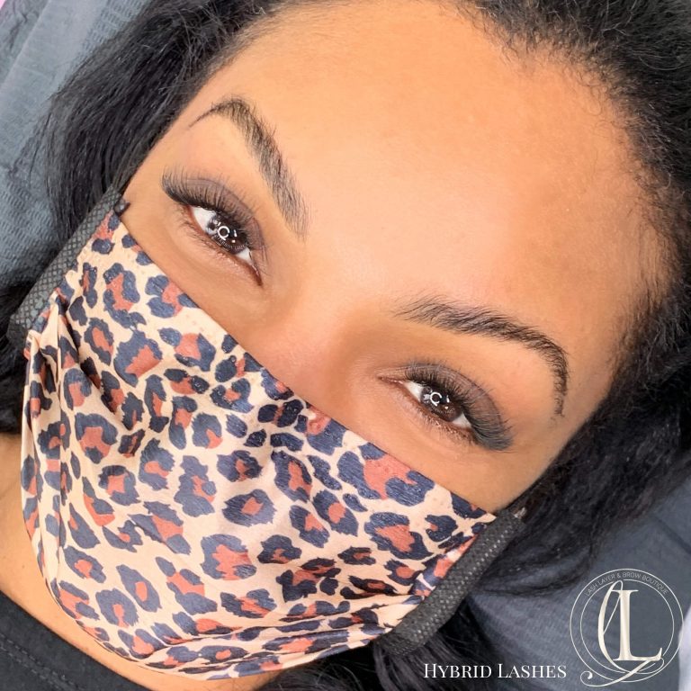 Woman with Hybrid Eyelash extensions done at Lash Layer Boutique In Pickering